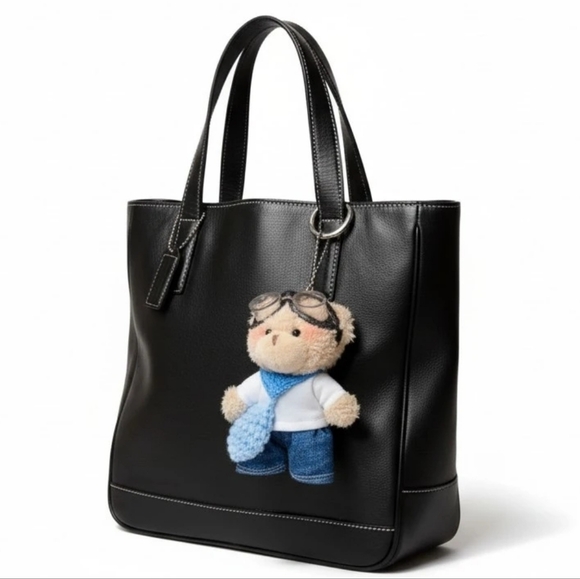 Coach Handbags - Coach Vintage Black Leather Tote with Plush Charm